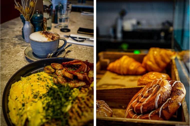 Split image showing two scenes: on the left, a brunch plate with folded eggs, bacon, sausage, and toast next to a cup of frothy cappuccino, set on a table with cutlery and decor. On the right, a display of fresh pastries, including croissants and iced cinnamon rolls, in a wooden tray.